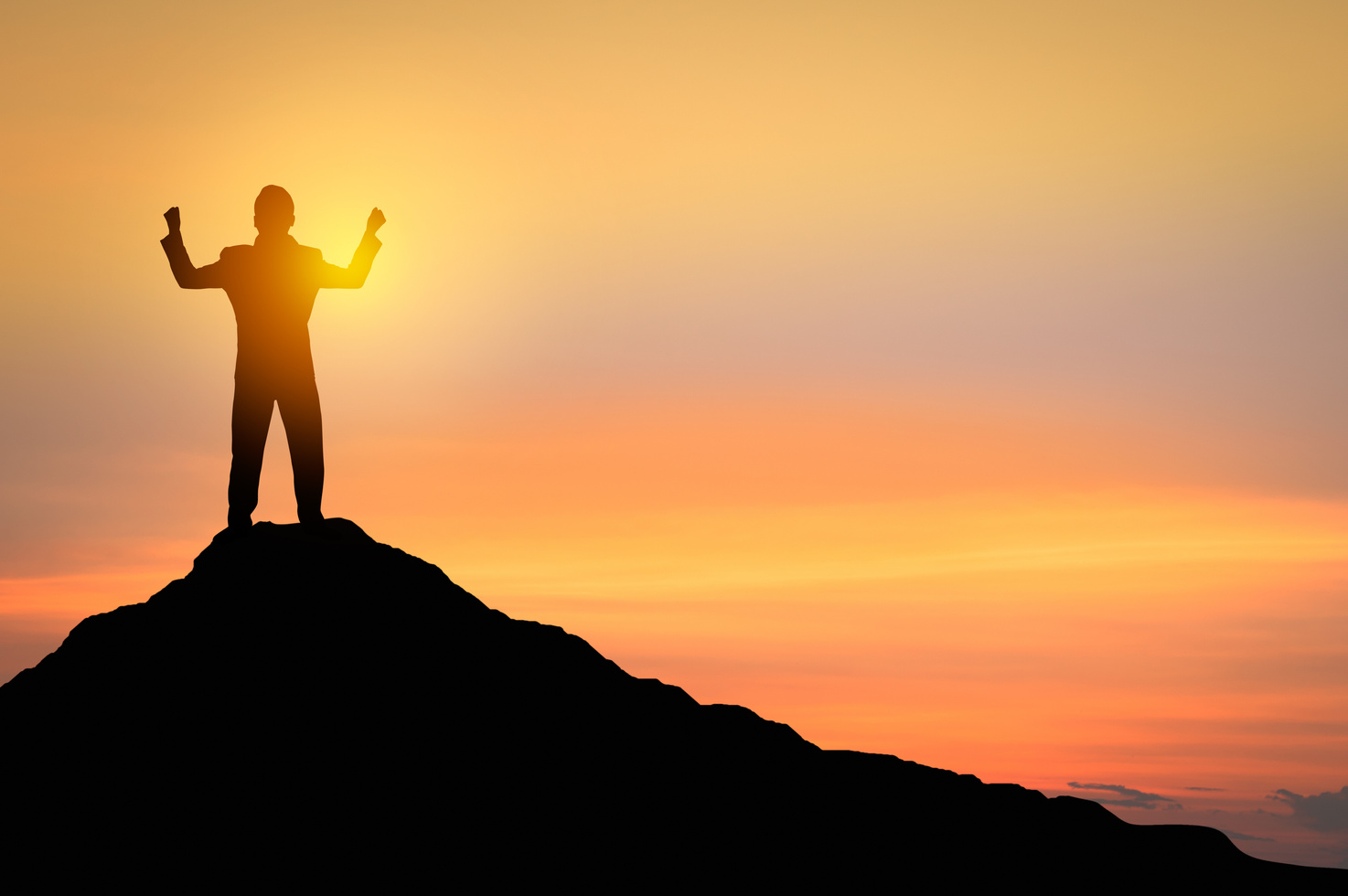 Success and Winner Concept, Silhouette of Man Standing and Showi